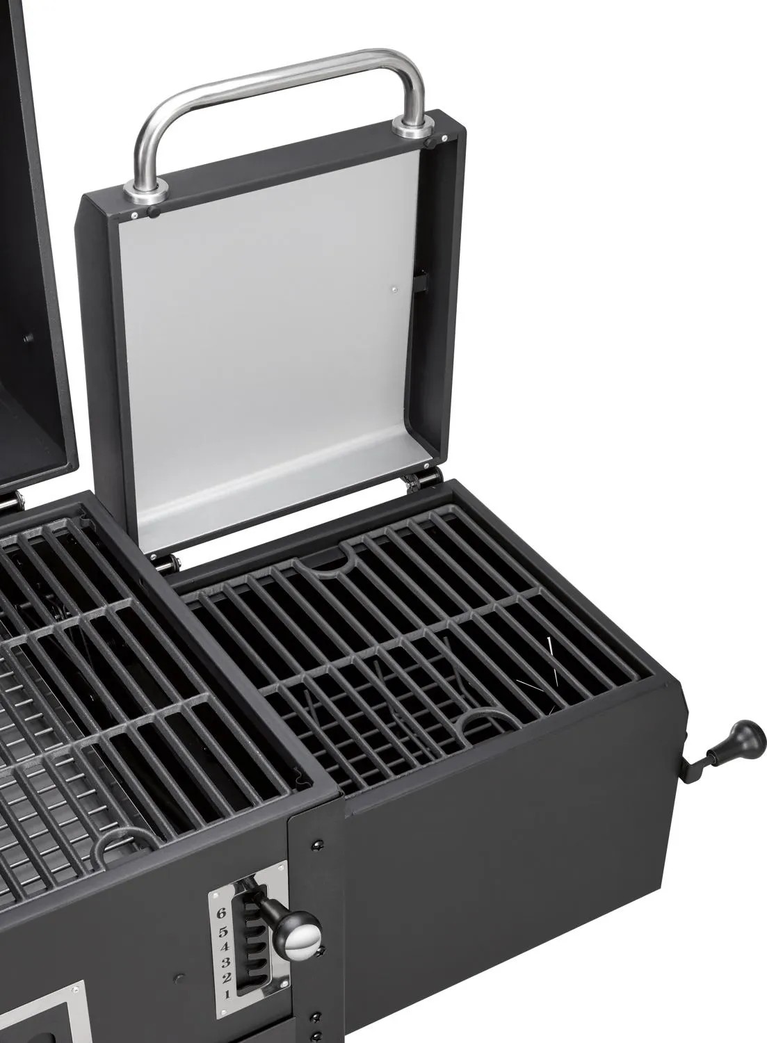 A t.b.t. kombinált grill részlete nyitott fedéllel és grillráccsal. A t.b.t. kombinált grill részlete nyitott fedéllel és grillráccsal.