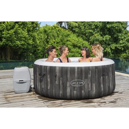 Bestway Lay-Z-Spa Bahamas AirJet felfújható pezsgőfürdő 4 emberrel a kertben. Bestway Lay-Z-Spa Bahamas AirJet felfújható pezsgőfürdő 4 emberrel a kertben.