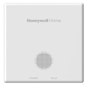 Honeywell Home érzékelő, fehér ház hangszóróráccsal, tápellátás és hibajelzők.