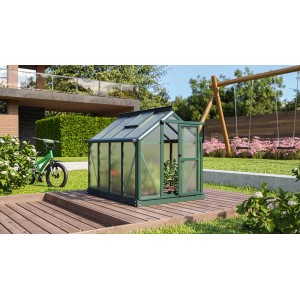 Vitavia Merlin Smaragd mini üvegház, 87x111cm, nyitott ajtóval a kertben.