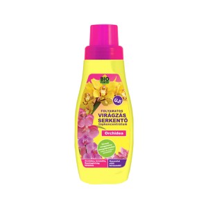 Sárga orchidea tápoldat rózsaszín kupakkal.
