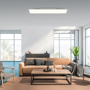Fehér, dimmelhető LED panel 100x25 cm-es a Just Light-tól, egy szoba mennyezetére szerelve.