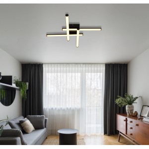 Modern LED Kirina mennyezeti lámpa, matt fekete, forgatható elemekkel a nappaliban.