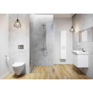 Modern fürdőszoba t.b.t. mosdóval, zuhanyzóval és WC-vel szürke fal előtt.