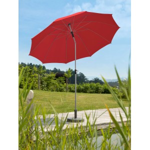 Piros Schneider piaci napernyő (Ø 220 cm) push-up mechanizmussal a kertben.