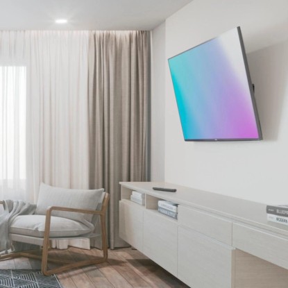 Hama dönthető TV fali tartó 81-165cm TV-hez, 35kg-ig. Nappali jelenet.