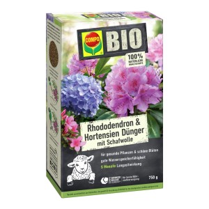 Compo Bio rododendron hosszú hatású trágya 750g juhgyapjúval. Zöld csomagolás rododendron virágokkal és bárány szimbólummal.